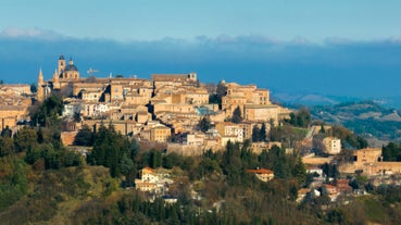 Aerial panoramic cityscape of Rome, Italy, Europe. Roma is the capital of Italy. Cityscape of Rome in summer. Rome roofs view with ancient architecture in Italy. 