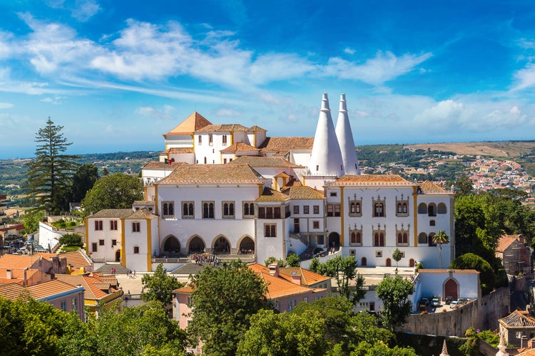 Photo of Palace of Sintra (Palacio Nacional de Sintra) in Sintra in a beautiful summer day, Portugal.