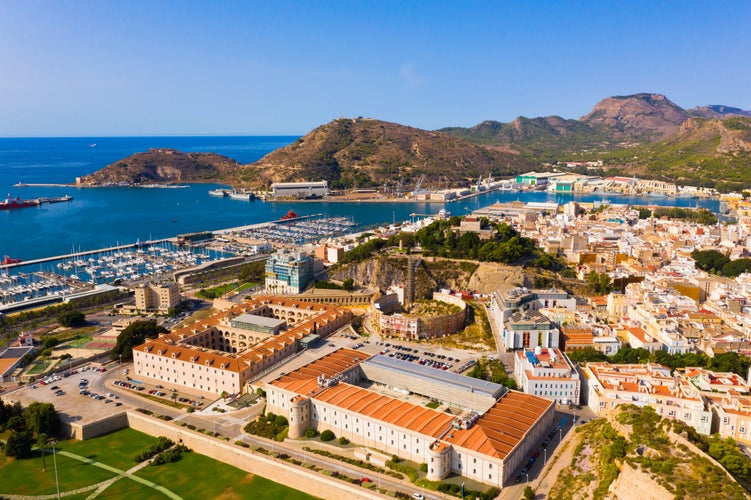 Panoramic aerial view of Cartagena city by Mediterranean coast overlooking port and marina with moored pleasure yachts, Spain