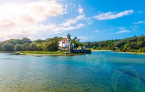 Photo of Ballota beach with the islet Castro, Llanes,  Spain.