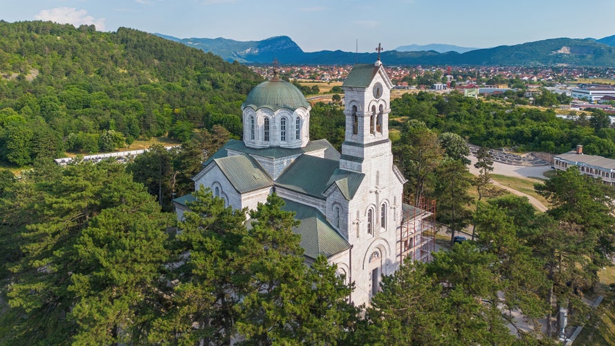 phot of view of Aerial view of the Cathedral Church of St. Basil of Ostrog in Nikšić, Montenegro - Serbian orthodox church in a Byzantine style