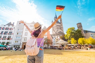 Photo of beautiful panoramic view of historic Bremen Market Square in the center of the Hanseatic City of Bremen with The Schuetting and famous Raths buildings on a sunny day with blue sky in summer, Germany.