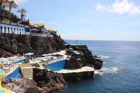 Photo of panoramic aerial view of idyllic coastal village of Porto da Cruz Madeira island, Portugal.