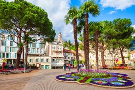 Photo of aerial view of Verona historical city centre, Ponte Pietra bridge across Adige river, Verona Cathedral, Duomo di Verona, red tiled roofs, Veneto Region, Italy.