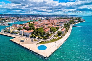 Photo of aerial view to the town of Porec in Istria, Croatia on Adriatic coast.