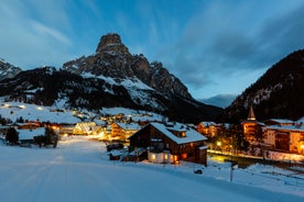 photo of Ski Resort of Corvara on a sunny day, Alta Badia, Dolomites Alps, Italy.