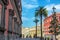 photo of Colorful and beautiful architecture with palm trees in front of the National Archaeological Museum in Naples, Italy.