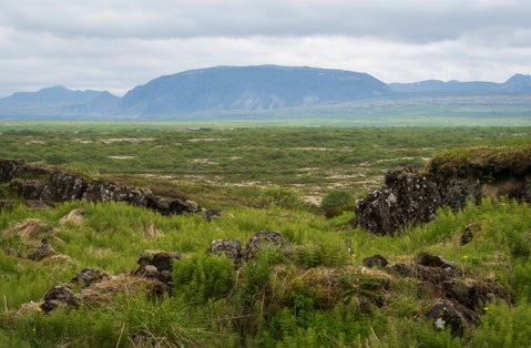 photo of The Lögberg Fault at Thingvellir National Park in Iceland During a Foggy Summer Day.