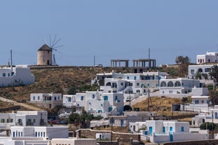 Photo of beautifull view over Mykonos from the sky with drone at the whitewashed village Greece.