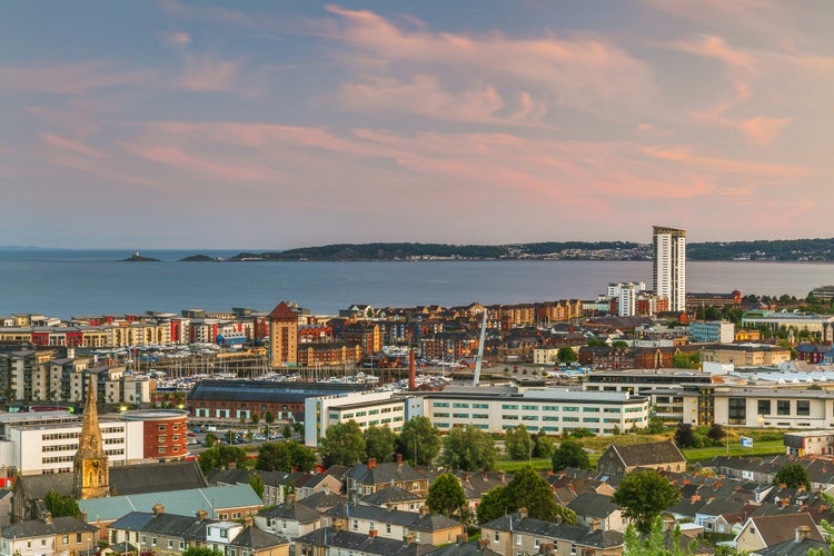 Photo of aerial View of Swansea City at magical sunset ,Wales.