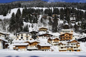 Photo of aerial view over Saalbach village in summer, Austria.