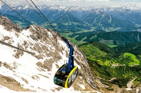 Photo of Suspension Bridge of Dachstein Skywalk viewpoint in Austria, with people, in Ramsau am Dachstein.