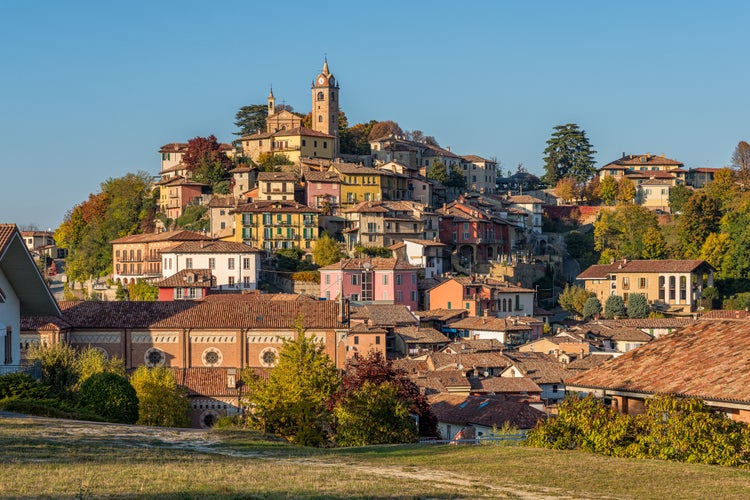 photo of Panoramic sight of Monforte d'Alba village during fall season. Langhe region of Piedmont, Cuneo, Italy.