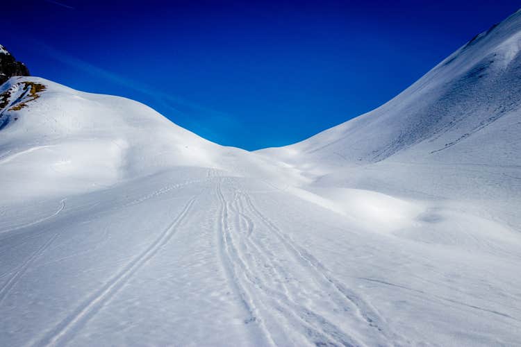 Photo of ski touring the Gemstelpass which is connecting the Tannberg region with the Kleinwalsertal, Hirschegg in the Austrian alps.