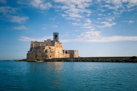 Photo of panoramic view of the ancient town of Matera (Sassi di Matera), European Capital of Culture 2019, in beautiful golden morning light with blue sky and clouds, Basilicata, southern Italy.