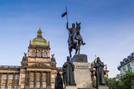 Photo of equestrian statue of Saint Wenceslas and the Neorenaissance National Museum, Czech Republic.