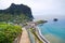 Photo of panoramic aerial view of idyllic coastal village of Porto da Cruz Madeira island, Portugal.