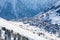 Photo of aerial view of beautiful winter landscape of Les Deux Alpes surrounded by mountains, France.