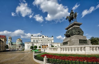 Photo of beautiful view of the Orthodox Rila Monastery, a famous tourist attraction and cultural heritage monument in the Rila Nature Park mountains in Bulgaria.