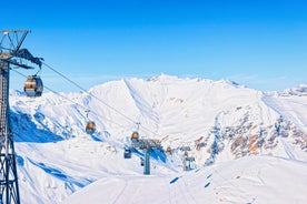 Photo of panorama of Hintertux ski resort in Zillertal Alps in Austria with the far view of ski lifts and pistes.