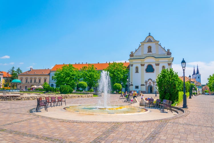 View of the Marcius 15 square in the hungarian city Vac dominated by the feherek church