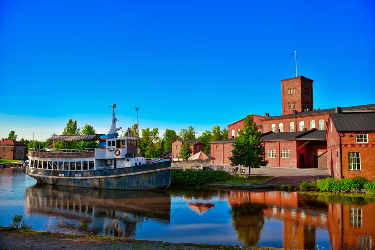 Old cotton spinning mill buildings of red brick in Forssa, Finland