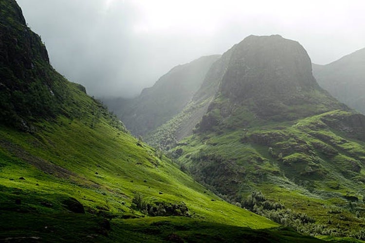 The dramatic Glencoe Pass shrouded in mist on a cloudy day.jpg